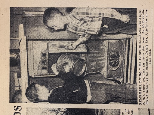 Children operating a school stove